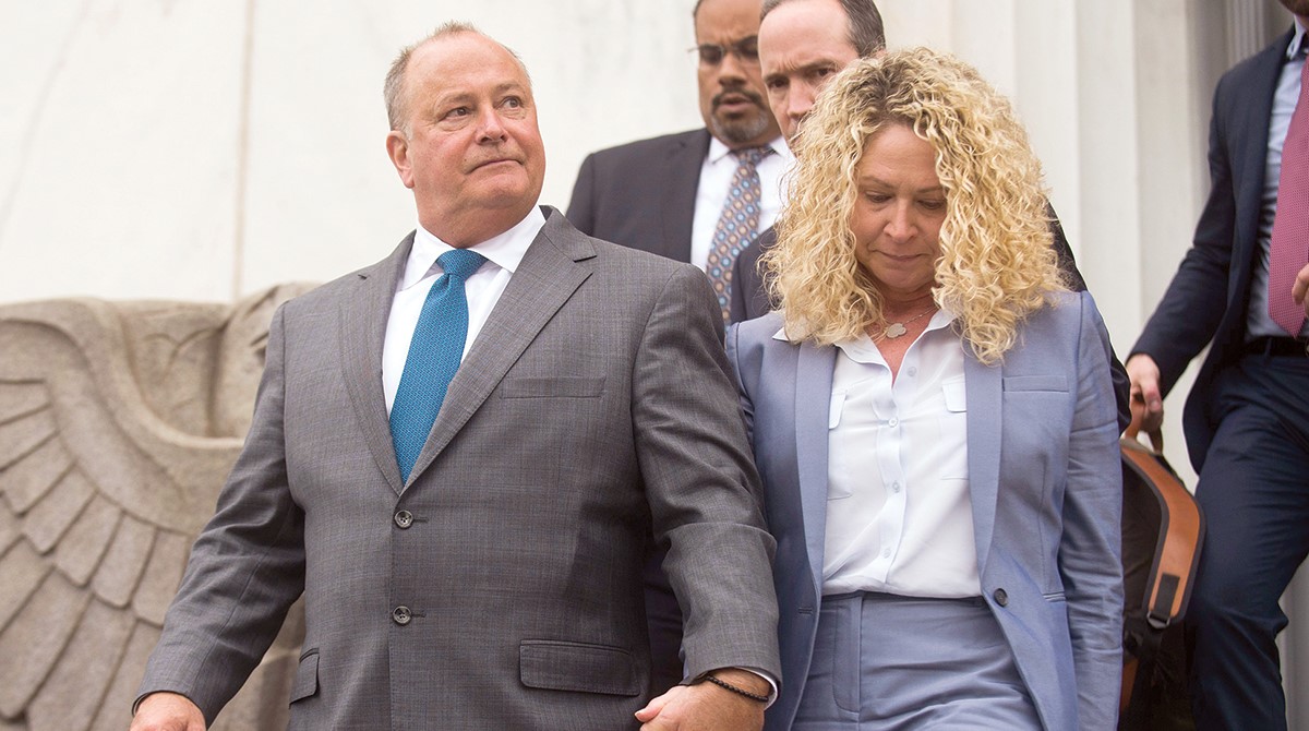 Mark Hazelwood, former Pilot Flying J President, exited a federal courthouse with his wife, Joanne, in Chattanooga, TN on September 26, 2018. (Caitie McMekin/News Sentinel)